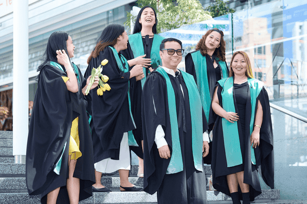 Graduates at the stairs